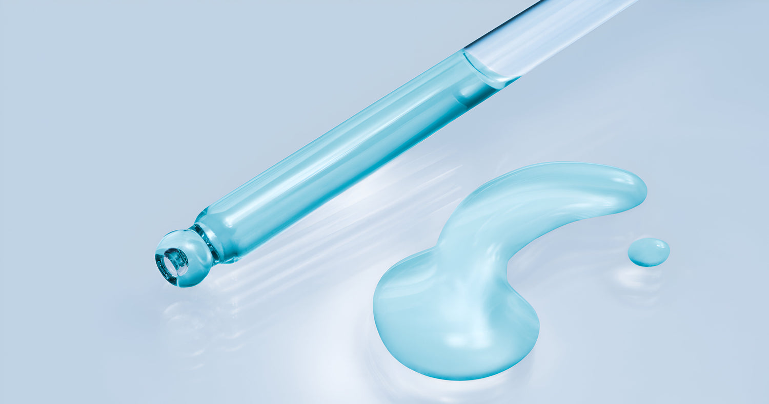Nano colloidal liquid copper next in a glass dropper next to a sample of colloidal liquid copper