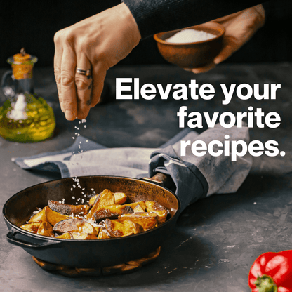 A chef sprinkling Nano Celtic Sea Salt on a batch of crispy potato wedges