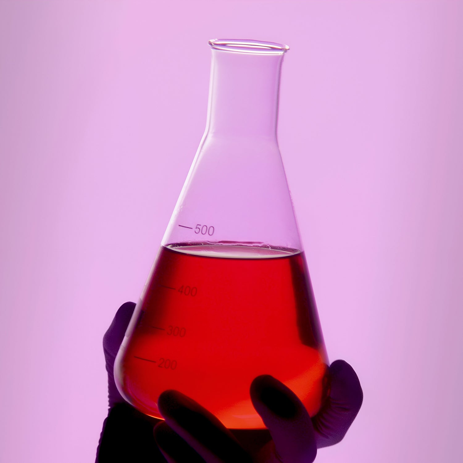 An erlenmeyer flask filled with Nano 24K Ruby Red Colloidal Gold natural liquid wellness supplement